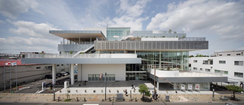 The exterior of the building has a stacked design