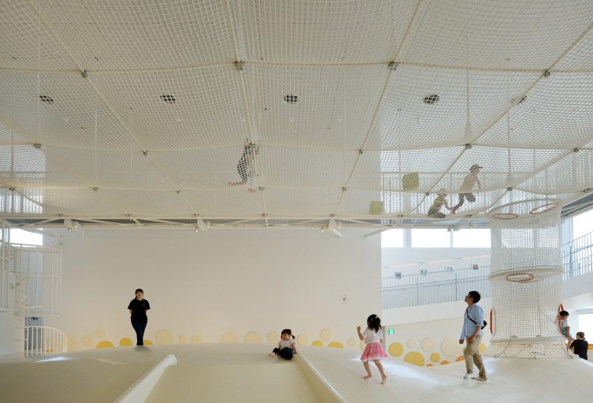A net play area covers the indoor playspace