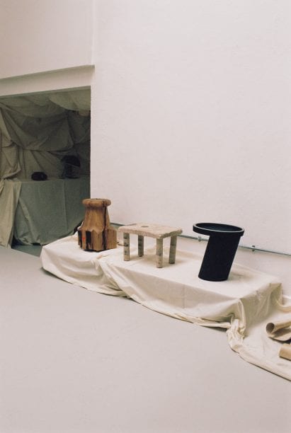 Objects were places atop fabric draped plinths at The Radford Gallery