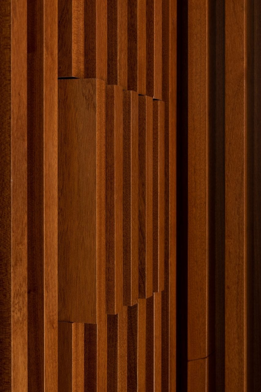 Wood lines the walls of the home