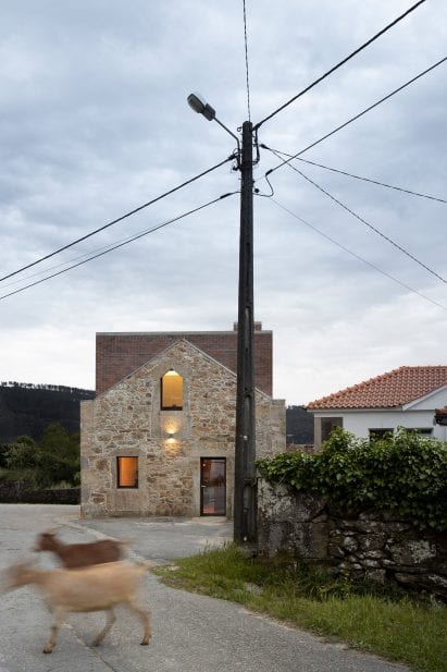 Box by Tiago Sousa has a brick and stone material palette