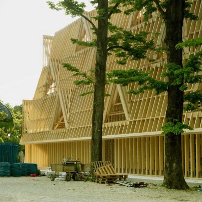 A frame of a four-storey home at the US Pavilion