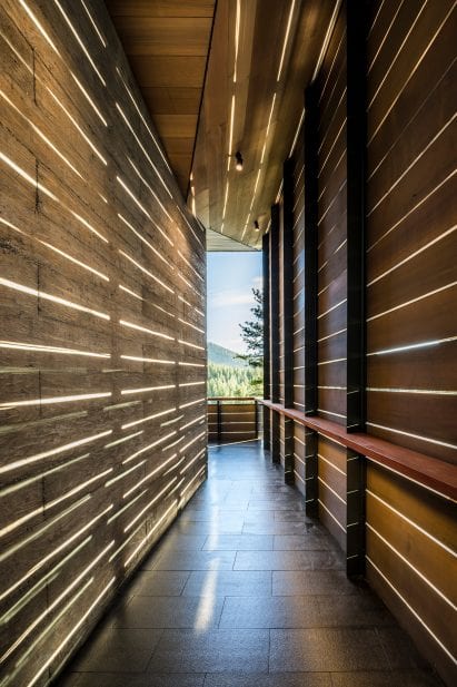 Cedar rain screens shelter the porch