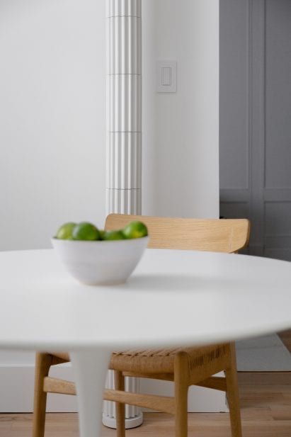 Brooklyn kitchen dining table with custom pipe cover