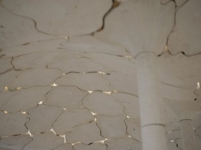 Limestone pieces form stone vaulted ceiling