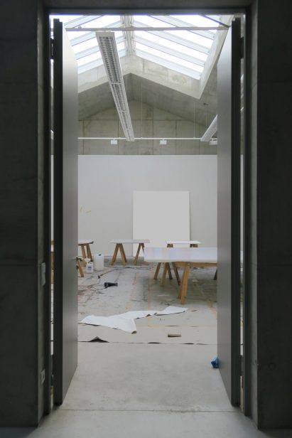 Artist's studio with trestle tables in O12 residence