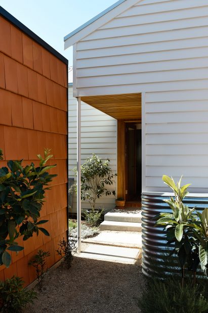 The existing home has a white panelled design