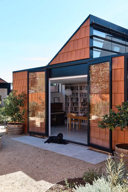 Black trim lines windows and doors at terracotta house