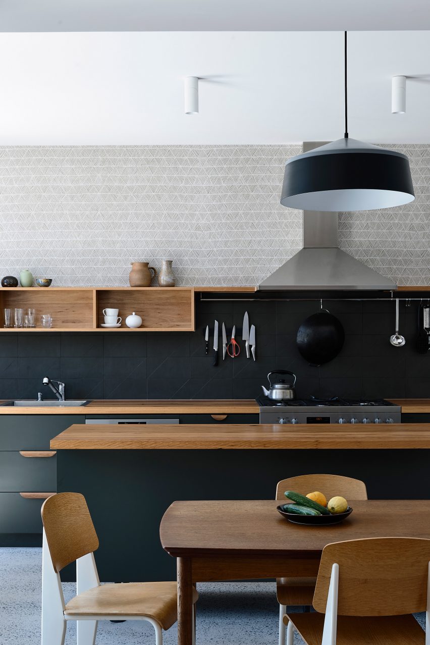 It has a dark kitchen