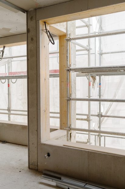 A timber-framed building under construction
