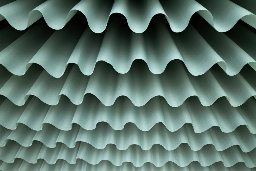 Fabric was draped in a ripple formation
