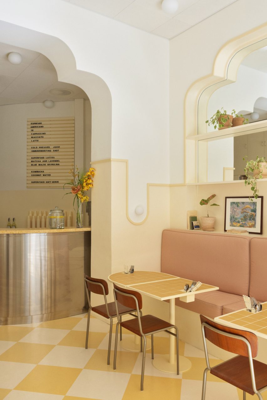 Seats and yellow custom-made tables