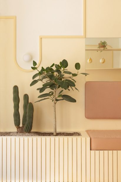 Corner with plant in pastel cafe