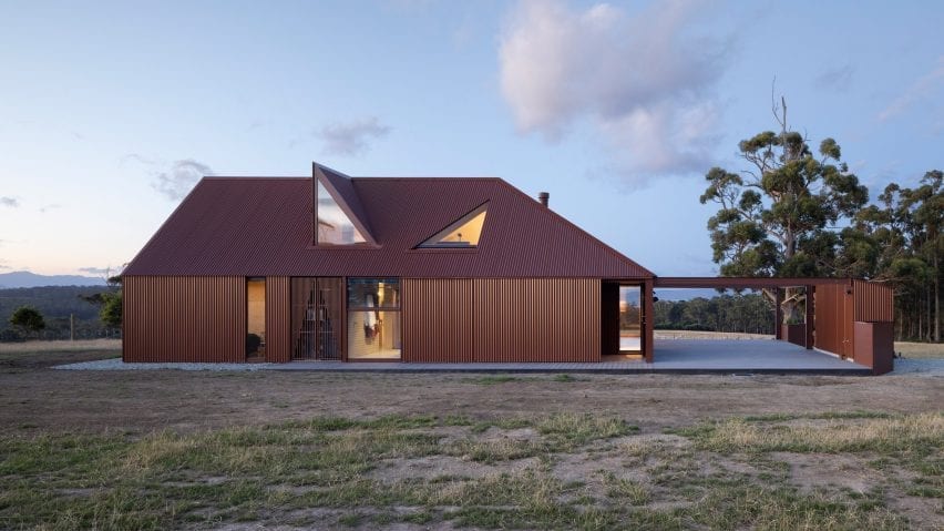 The roof has geometric shaped windows