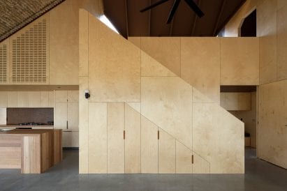 A mezzanine looks over the living space at Coopworth house