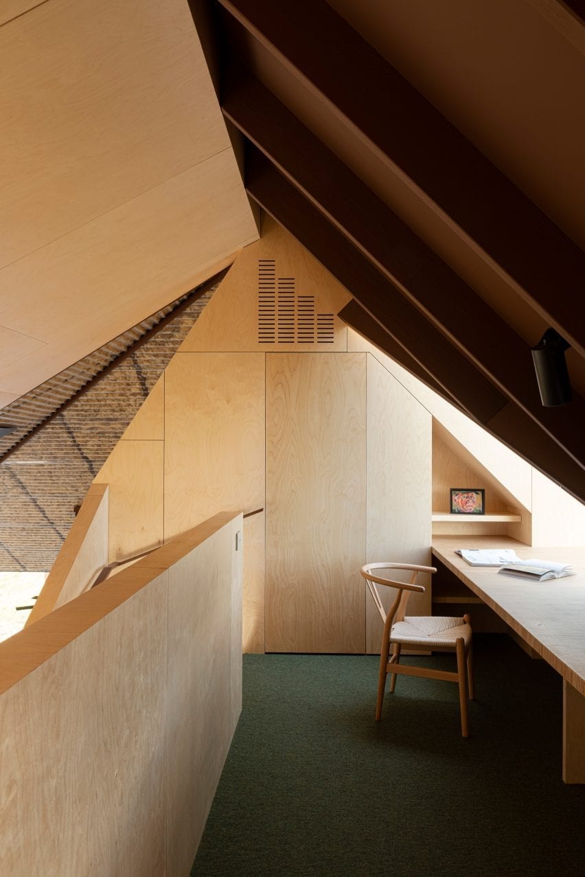 a study space has green carpet