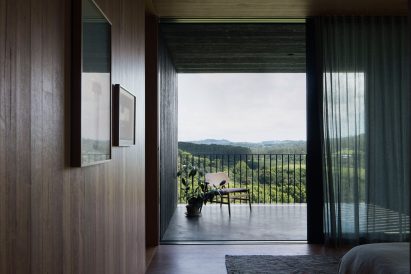 A bedroom with a private terrace
