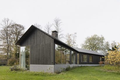 B-L House sits atop a concrete plinth