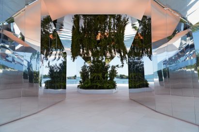 Green Lens by Doug Aitken is reflective
