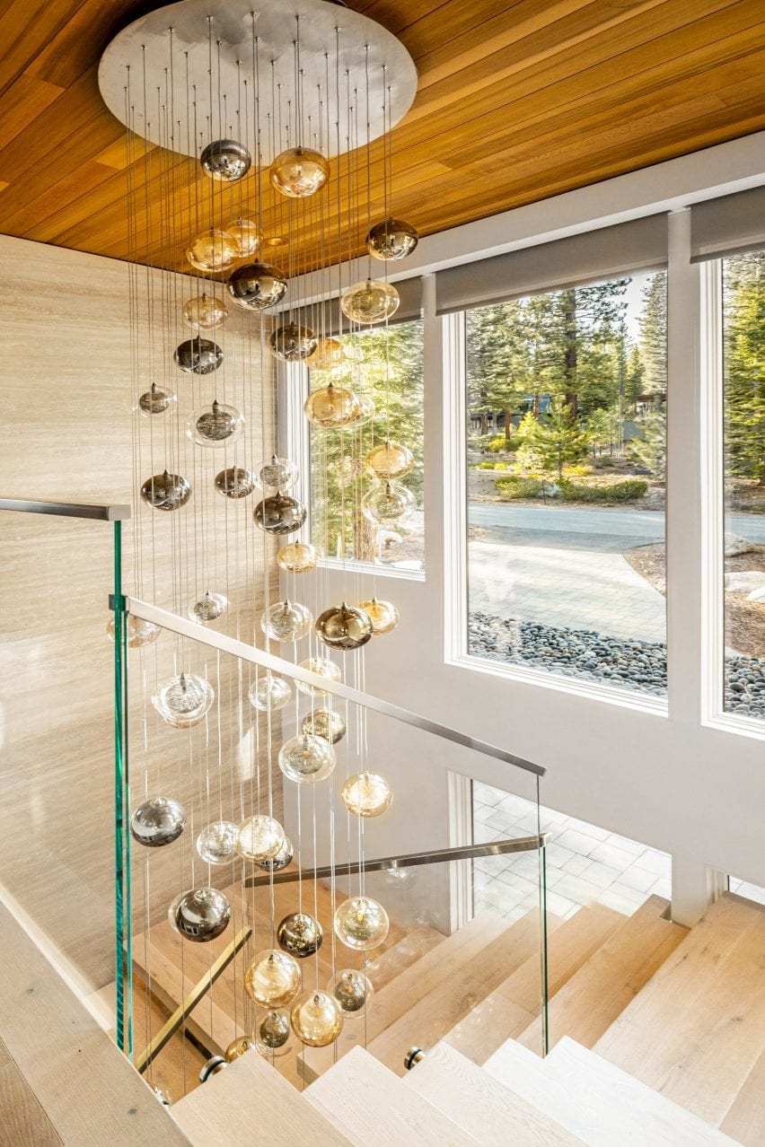 Kadur Drizzle lights hanging above a staircase