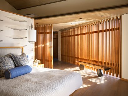 Light floods into a bedroom 