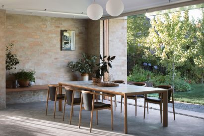 A dining room with brick walls