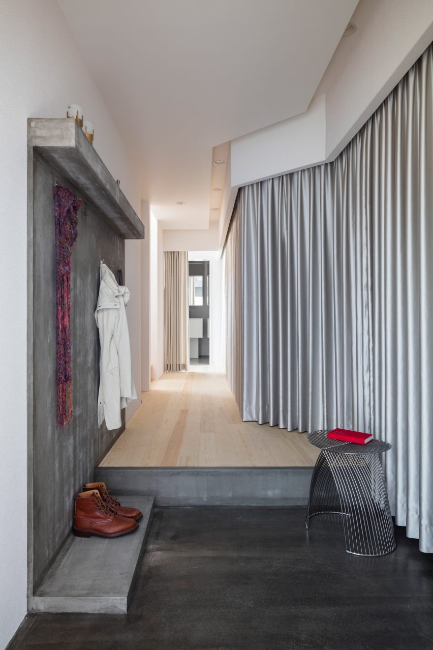 Silver curtains in hallway at Landscape House in Japan
