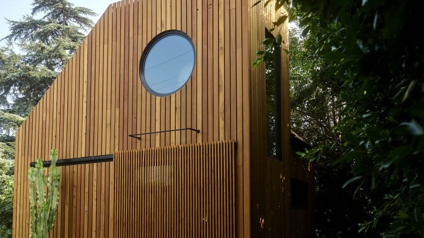Monon Guesthouse's sliding door and circular window