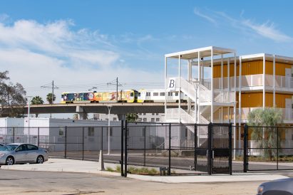 The landscape has parking spots for residents