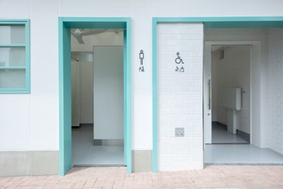 Blue door frame at public toilet