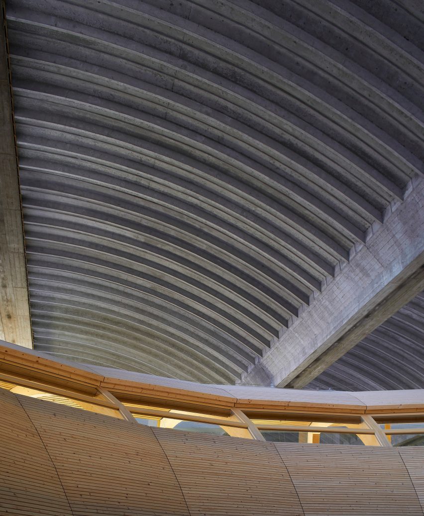 Wood contrasts with the concrete