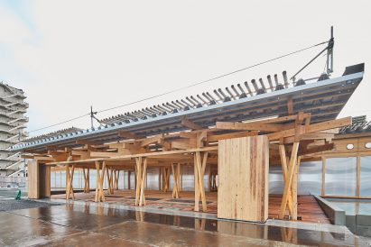 Beams were stacked at the olympic village plaza