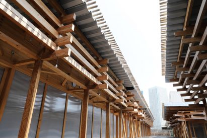 The olympic village plaza has a corrugated roof