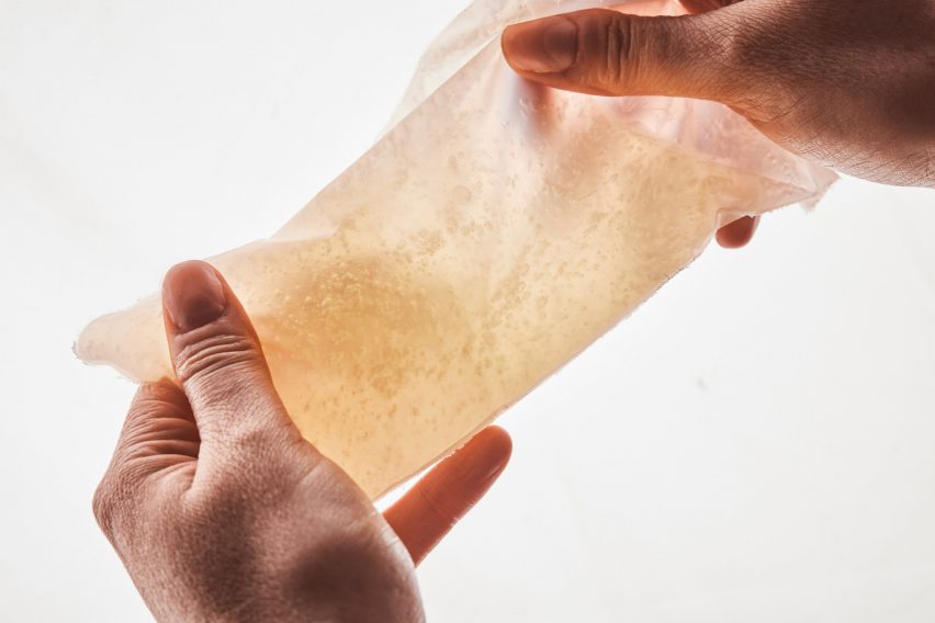 On Repeat biodegradable sachet in hands