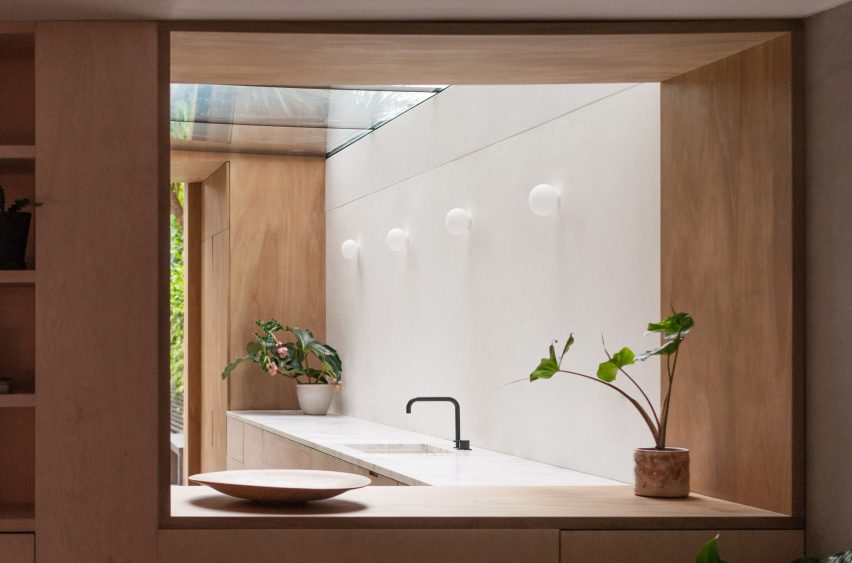 A view into a white-walled kitchen