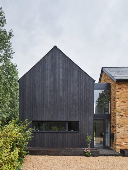 A blackened-timber house extension