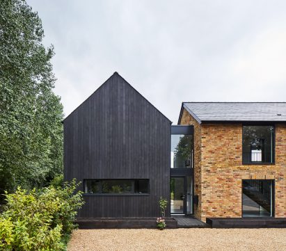 A blackened-timber house extension