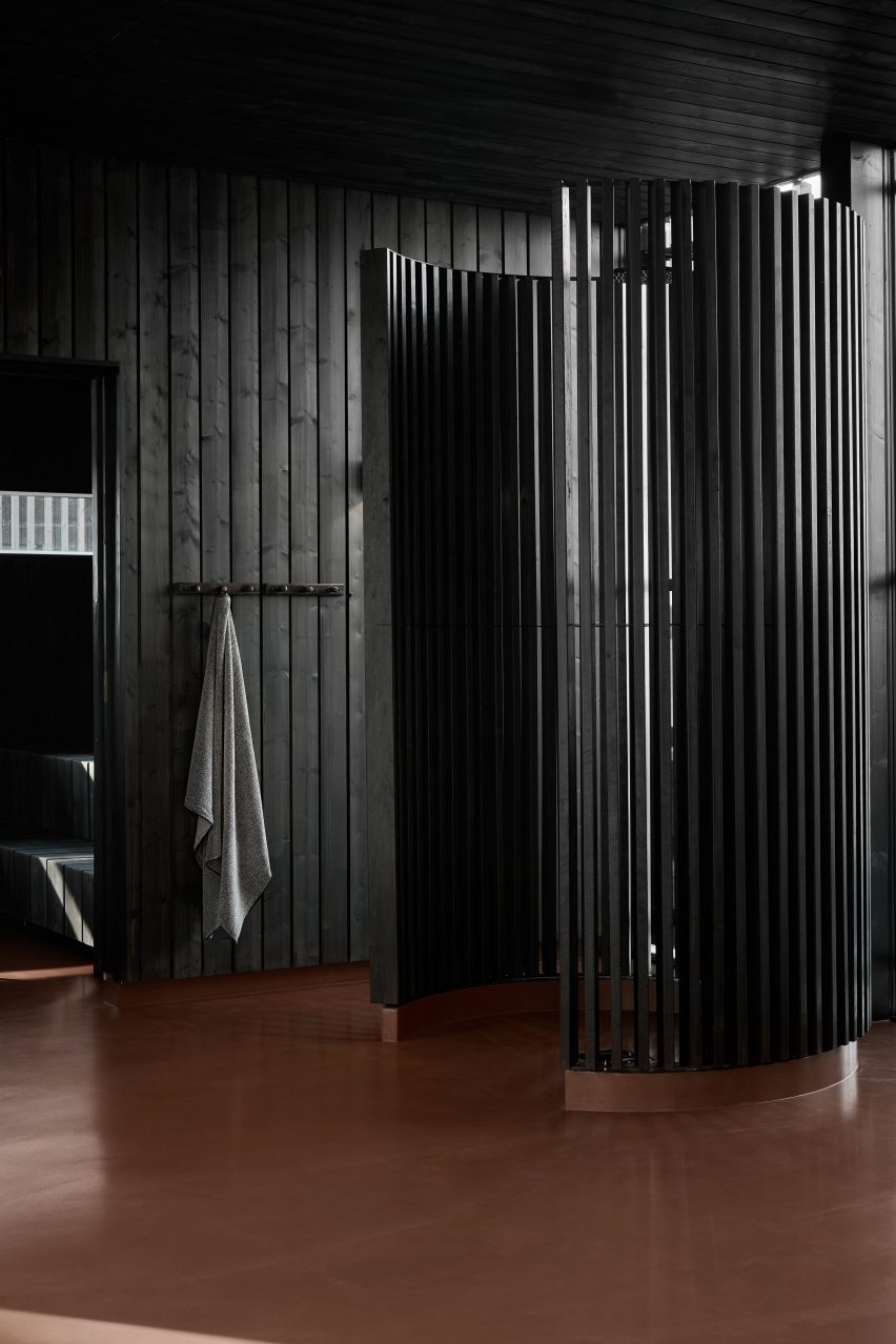 A black timber sauna