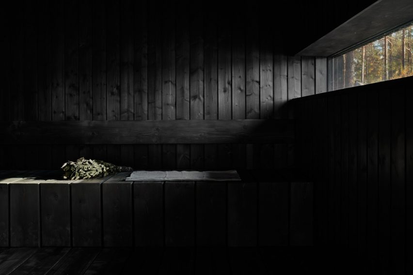 A black timber sauna