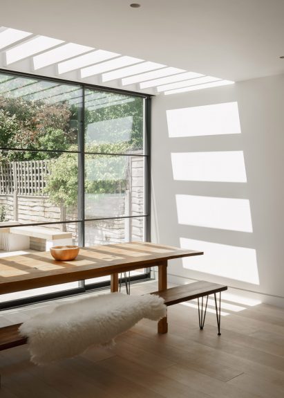 Kitchen and dining room extension with skylight in T-House by Will Gamble Architects