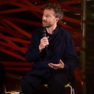 Thomas Heatherwick speaking into a microphone