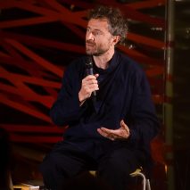 Thomas Heatherwick speaking into a microphone