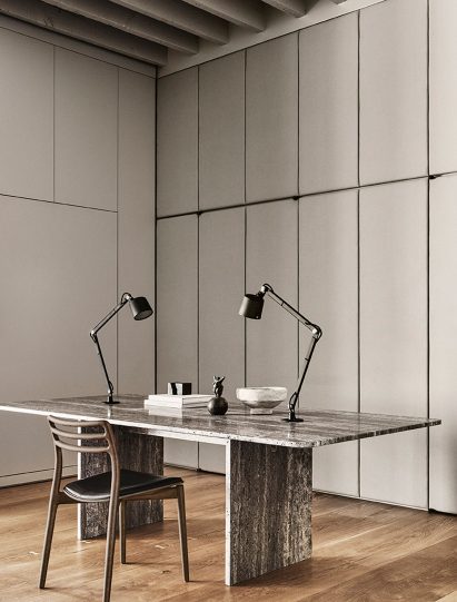Office with custom travertine desk