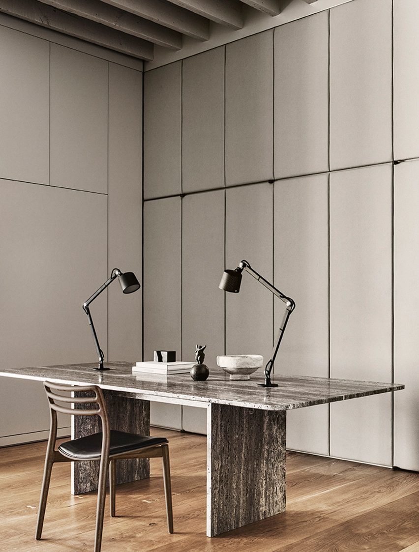 Office with custom travertine desk