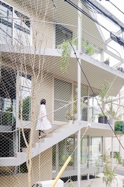 A house covered in metal mesh