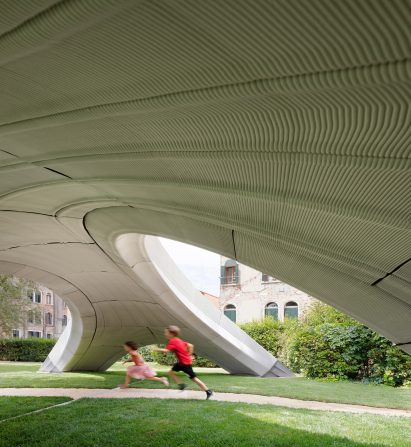 Children pictured running under the bridge