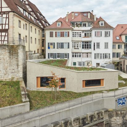 Residential + Commercial Building Conversion by Dannien Roller Architekten + Partner PartGmbB