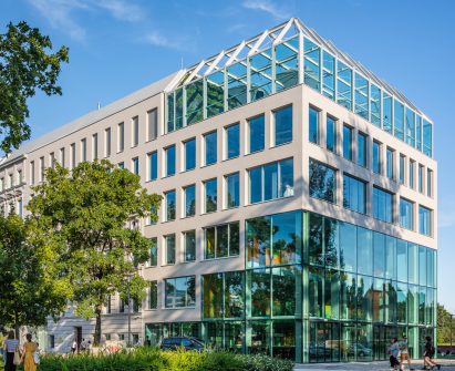 A photograph of a glass building