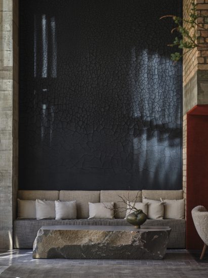 Stone table and plaster wall covering