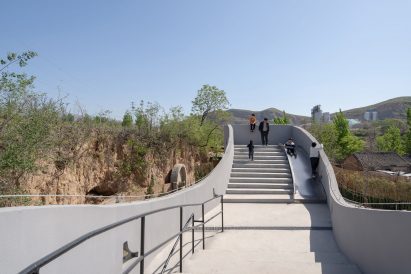 Atelier Xi designed the project to blend with the landscape